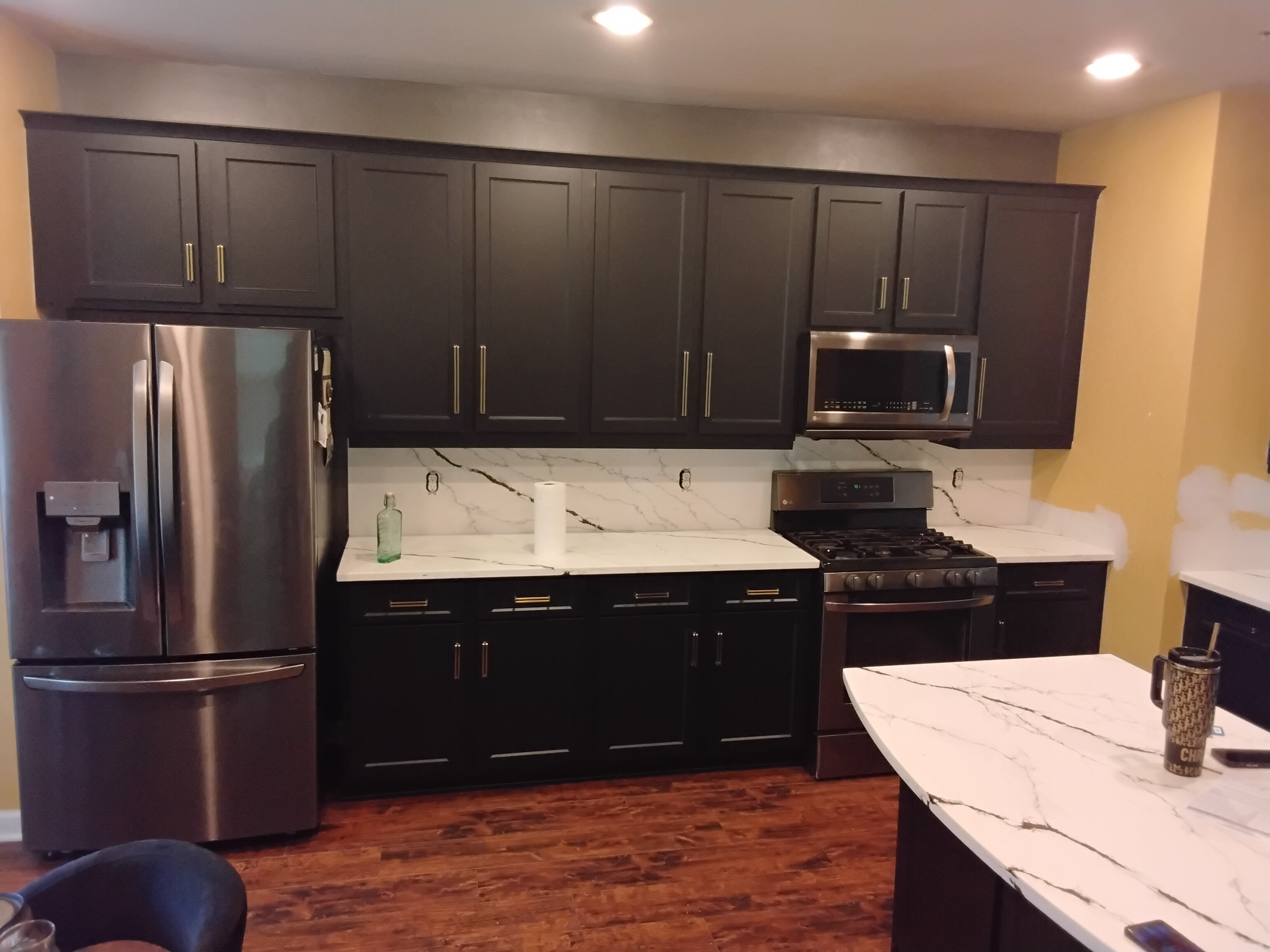 Black kitchen cabinetry installation